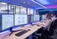 Call center agents using knowledge management tools and knowledge base software on multiple screens