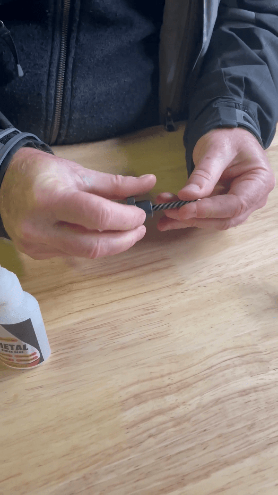 Step #4: Thread the stud into the hand knob until it bottoms out.