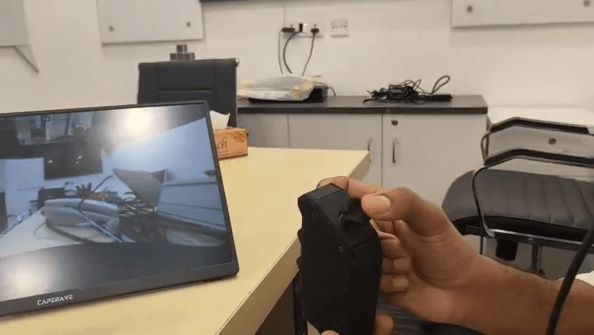 Step #19: Push the joystick right to snap to the right camera feed.