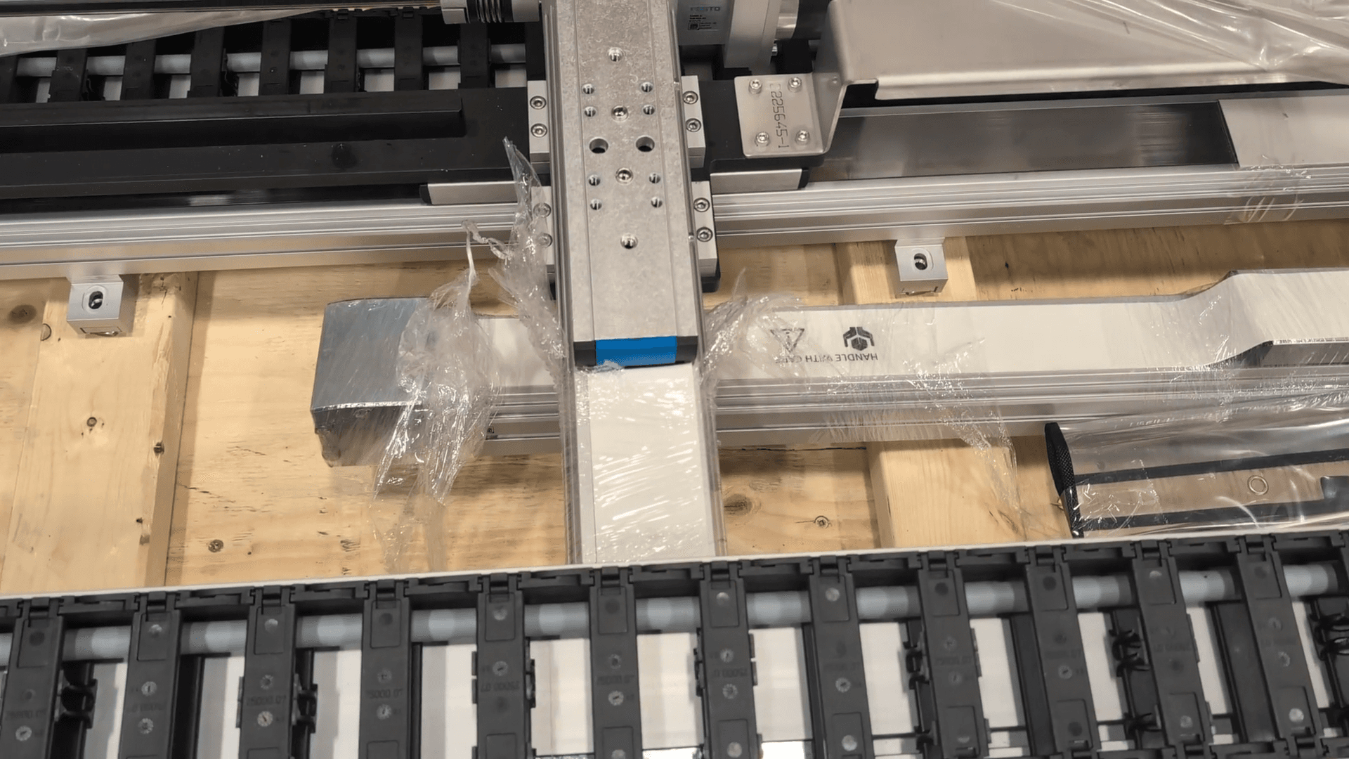Step #1: Remove the screws on the first side of the gantry.