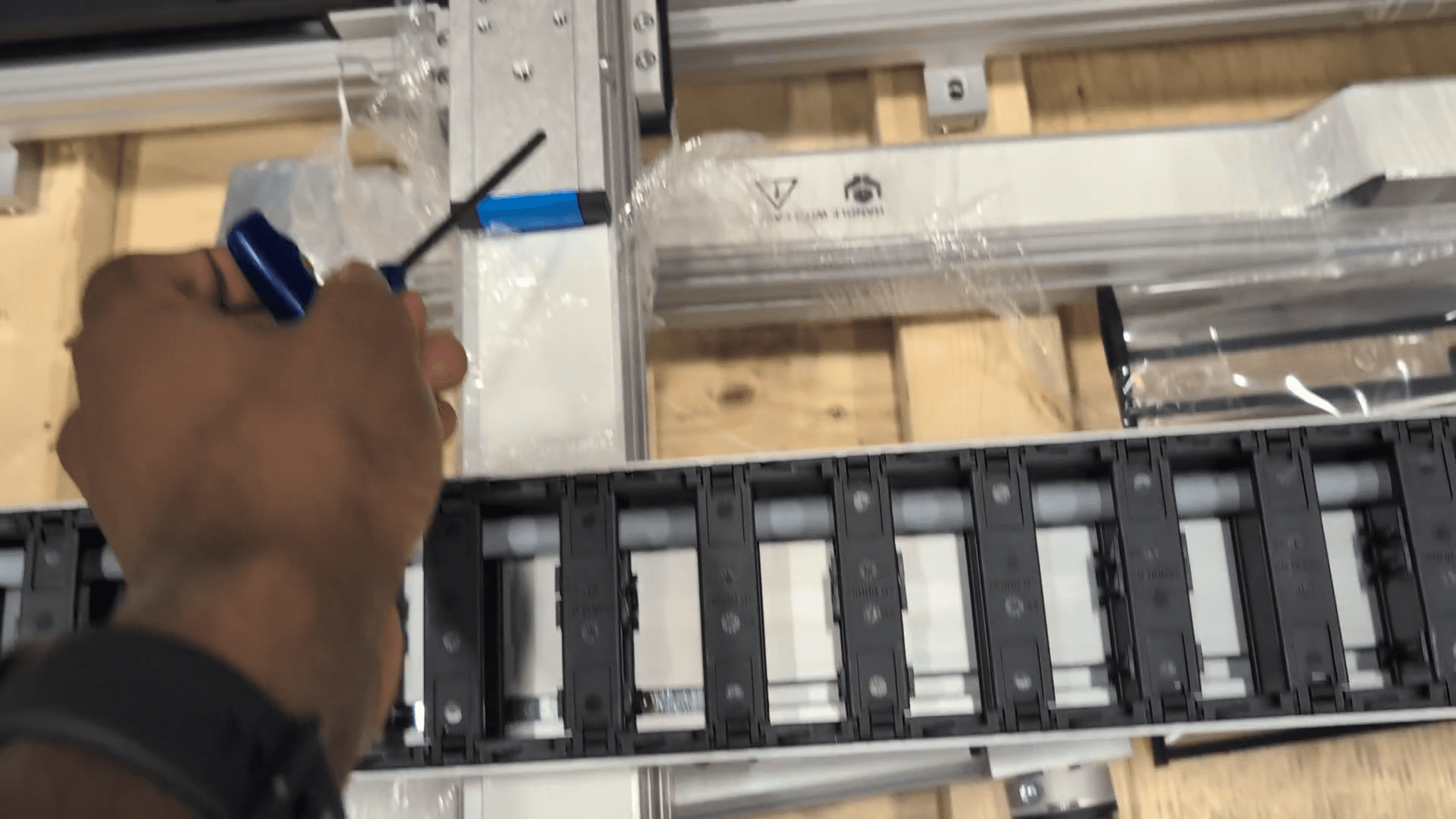 Step #6: Loosen the screws on the upper mounting bracket of the gantry.