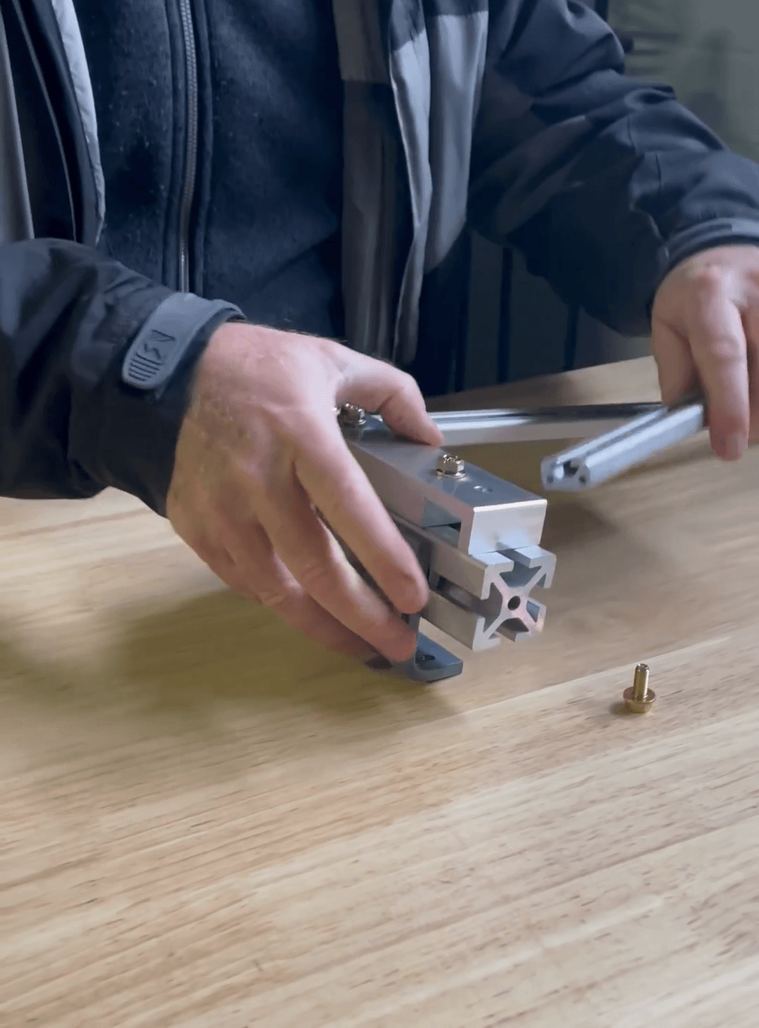 Step #9: Slide the second small rail into the parallel groove on the main assembly.